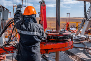 Oil field worker at a drilling site in South Texas