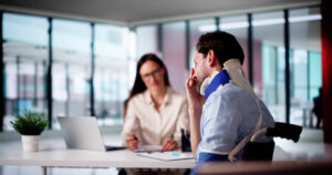 Texas personal injury attorney reviewing damages with an injured client