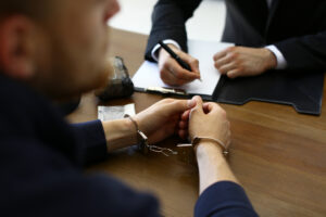 San Antonio criminal defense attorney speaking with a client