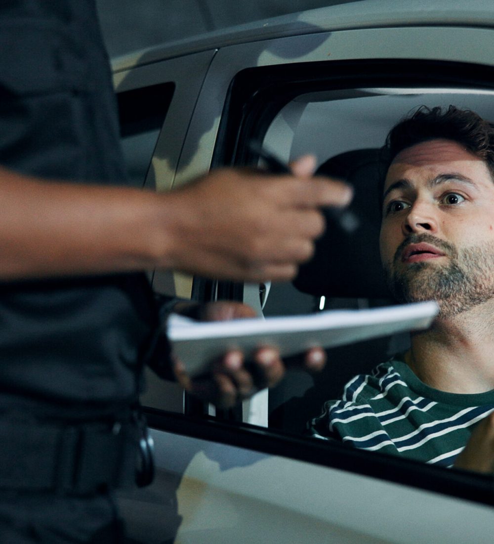 Man, police and stop car for fine, registration check and speeding for traffic warning. Person, law enforcement and licence for drunk driving, ticket penalty and transport risk for violation at night.