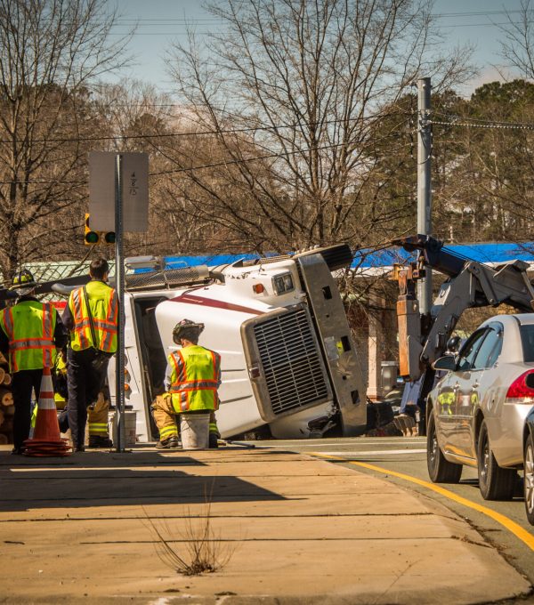 Logging Truck overturned in accident on highway