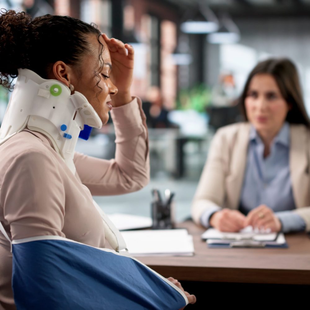 Woman Lawyer Securing Compensation For Injured Workers' Work Accidents